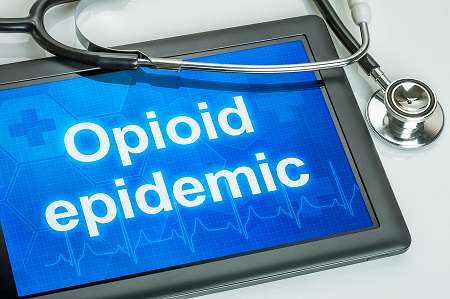bigstock tablet with the text opioid ep 211842565