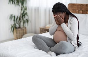 bigstock sad black pregnant woman cryin 391432763