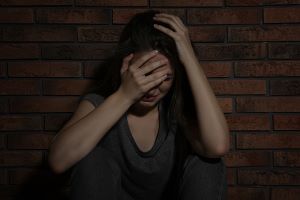 bigstock abused young woman crying near 340812220